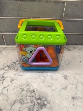 Colorful Shape Sorter Toy - Green, Yellow, Blue, Purple